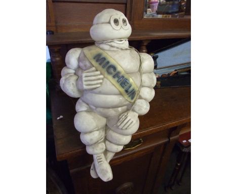 Large plastic illuminated Michelin man with mounting bracket for lorry roof