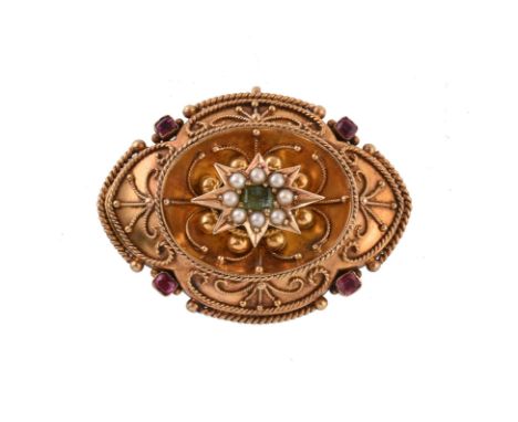 A mid Victorian ruby, emerald and seed pearl brooch, 1868 registration mark, the central star shaped panel set with a cluster