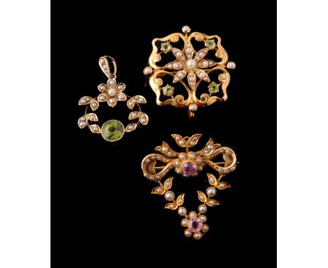 An Edwardian peridot and half pearl pendant, circa 1910, the circular mixed cut peridot set within a foliate swag mount of ha