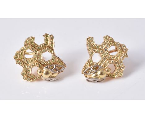 A pair of honeycomb diamond earrings, the honeycomb panels set with brilliant cut diamonds, approximately 0.70 carats total, 