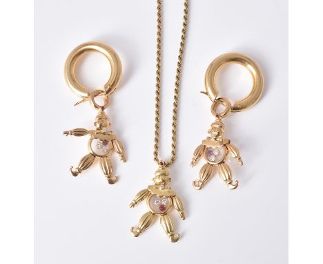 A suite of 18 carat gold diamond and ruby Happy Clown jewellery by Chopard, the ear pendants with articulated clowns with two