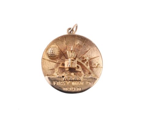 Moon Landings 1969, a 9ct gold concave pendant, terrestrial and lunar surfaces, rev. three-dimensional representation of the 