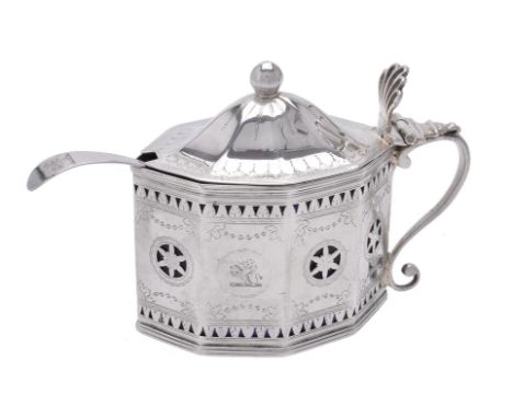 A George III silver octagonal mustard pot by Hester Bateman, London 1789, with a ball finial to the domed cover, a shell shap