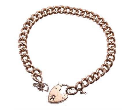 A late Victorian curb link bracelet, circa 1900, the polished curb links to a heart shaped padlock clasp, stamped M&N 15c, 21