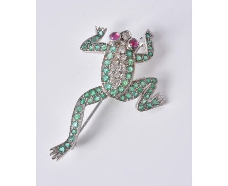 An emerald, diamond and ruby frog brooch, set with circular cut emeralds and brilliant cut diamonds, the eyes set with caboch