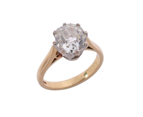 A single stone diamond ring, the old mine cut diamond in an eight claw setting, weighing 2.84 carats, Birmingham 18 carat gol