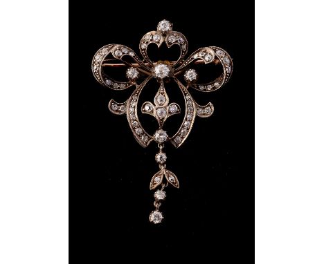 A late 19th century diamond brooch/pendant, circa 1890, of open swag design, set throughout with old cut and rose cut diamond