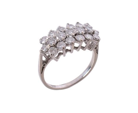 A 1970s diamond dress ring, with three rows of slightly graduated brilliant cut diamonds, the shank stamped 18ct, approximate