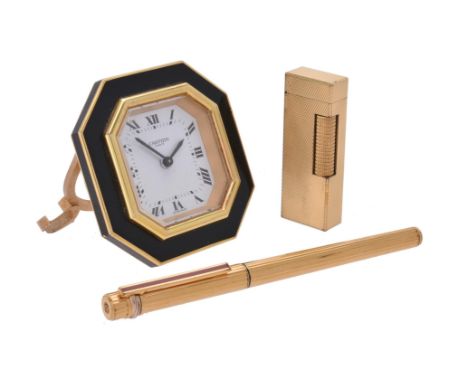 Cartier, Ref. 7507,Gilt metal and lacquer alarm clock, no. 15569Movement: Alarm movementCase: Gilt metal case, black lacquer 