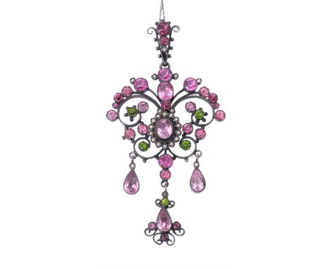 An Edwardian paste pendant, circa 1910, the scrolling pendant set with foil backed pink and green pastes and half pearl accen