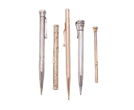 A gold coloured combination dip pen and propelling pencil, unmarked, engraved with foliate swags and floral sprays; a 9 carat