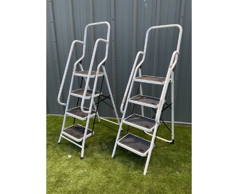 Pair of Painted white metal folding step ladders 