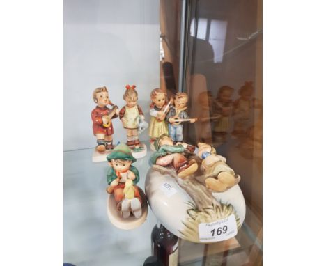 4 WEST GERMAN GOEBEL FIGURES AND 1 GOEBEL WALL POCKET