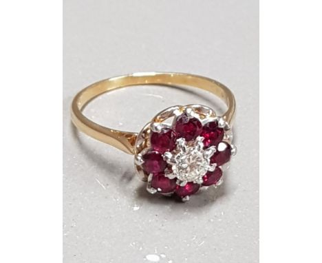 18CT YELLOW GOLD RUBY AND DIAMOND CLUSTER RING