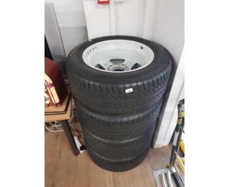 A SET OF 4 4X4 RIMS AND TYRES 255 55 R 18