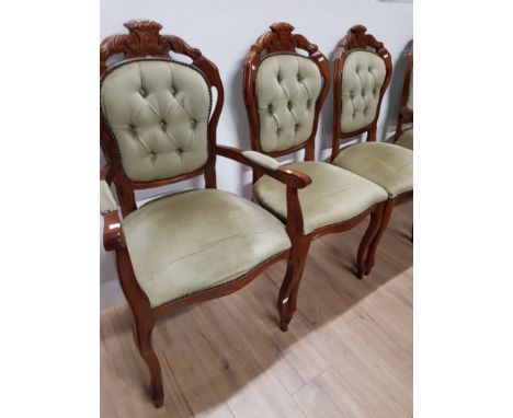 A SET OF 4 FRENCH STYLE CARVED BUTTON BACK DINING CHAIRS