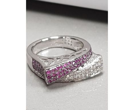 14CT WHITE GOLD PINK SAPPHIRE AND DIAMOND CROSSOVER CLUSTER RING