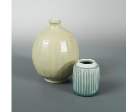 David Leach (British, 1911-2005), a Lowerdown Pottery vase, of globular form with facet cut sides under an oatmeal glaze, imp