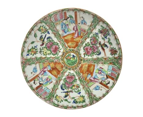 Late 19th century Cantonese enamel charger, decorated with panels of figures and panels of flowers amongst blossoming foliage