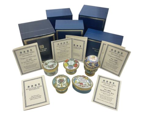 Five Halcyon Days enamel boxes, to include The 2000 Easter Egg, decorated with angels and cherubs upon a blue ground, The 200