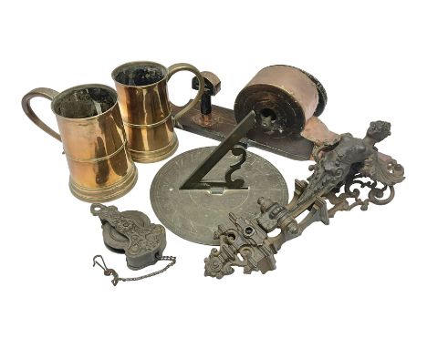Two 19th century copper tankards, one with weighted wooden base, together with copper and wooden mechanical bellows, sundial 