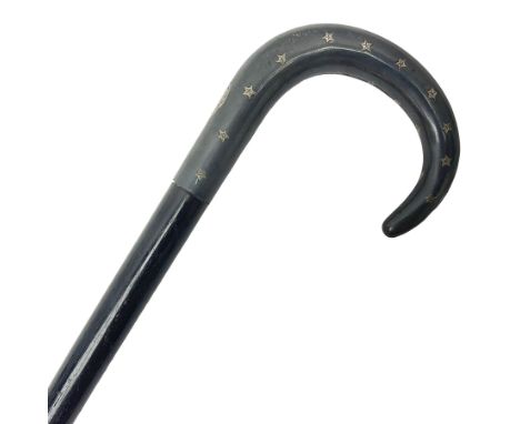 19th century ebonised walking stick, the curved handle inlaid with silver moon and stars, H90cm