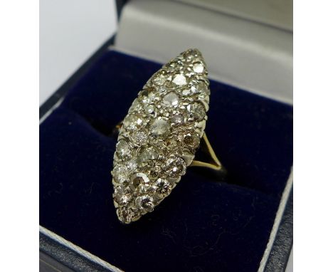 An 18ct gold set marquise shaped diamond cluster ring, 3.9g, N