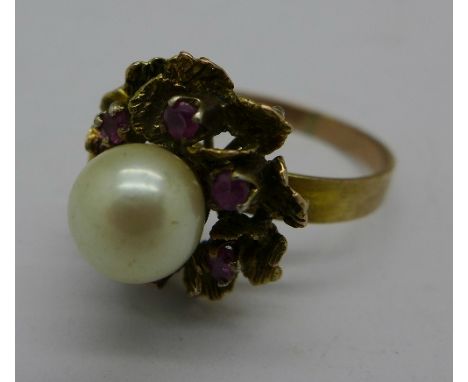 A 9ct gold, pearl and red stone ring, 3.6g, O