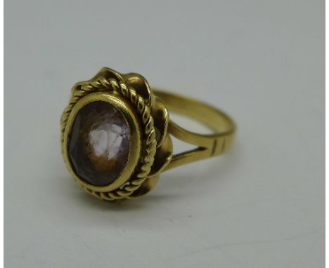 A 9ct gold and amethyst ring, 3.4g, M