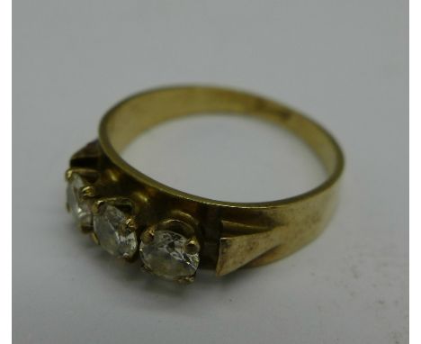 A 9ct gold and three stone cubic zirconia ring, 3.3g, Q