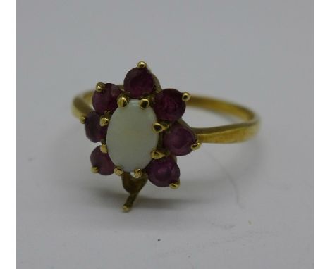 A 9ct gold, opal and ruby ring, lacking one stone, 1.5g, N