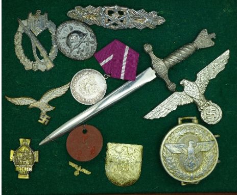 Mounted and framed German badges, two pairs of epaulettes, etc., including WWII 'bronze' Close Combat clasp, wound badge, a/f