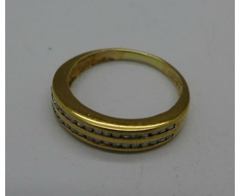 A yellow metal and diamond ring, 1.4g, I