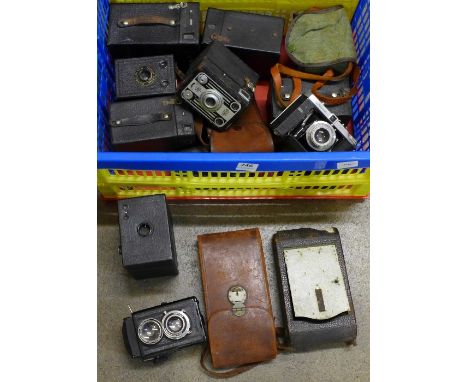 A collection of folding cameras, a Compur Rapid camera, etc.