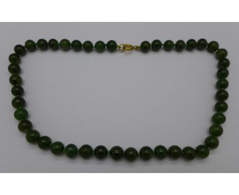 A jade bead necklace