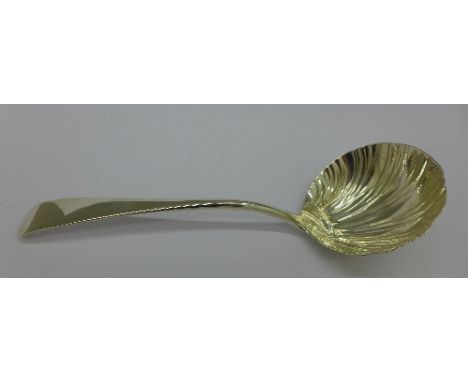 A silver ladle, early worn hallmark, London