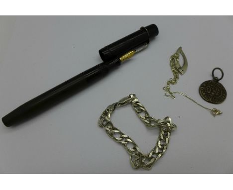 A fountain pen with 14ct gold nib, a silver pendant with chain, a silver bracelet and a N.W.3 Hampstead 'Her Halfe Peny'