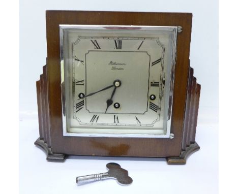 A J.W. Benson London Art Deco cased chiming mantel clock with key and pendulum