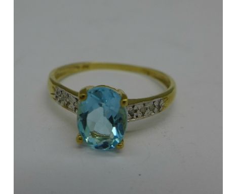 A 9ct gold, blue stone and diamond ring, 1.2g, O