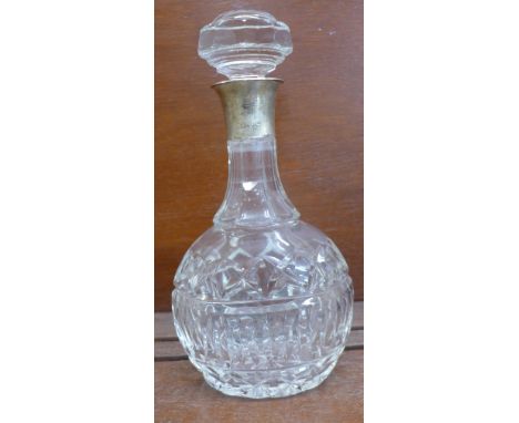 A silver mounted glass decanter