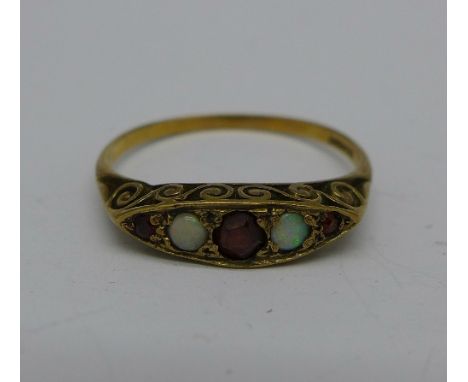 A 9ct gold, opal and garnet ring, 1.7g, Q