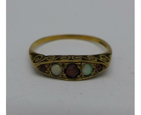 A 9ct gold, opal and garnet ring, 1.7g, Q