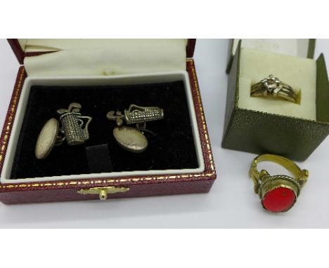 A pair of silver golf cufflinks and two rings, (one a metal detecting find, 20th Century)