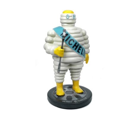 A hand-painted 'Mr Bibendum' standing forecourt display figure,modern, fibreglass construction, depicting the Michelin advert