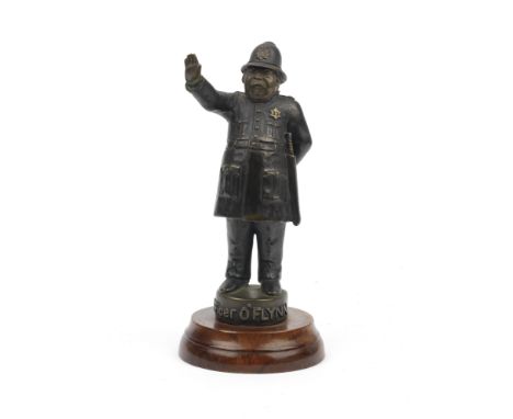An 'Officer O'Flynn' mascot, American, 1920s,patinated hollow cast bronze, 17cm high, marked 'THE MASCOT' to the rear of the 