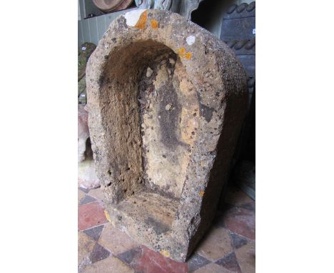 A weathered natural stone (possibly Cotswold) trough of rectangular tapered form with single D end, approx 70cm long x 48cm w