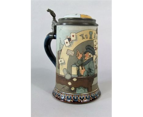 A late 19th century Mettlach Villeroy & Boch Stein with incised and painted humorous decoration after Heinz Schlitt incorpora