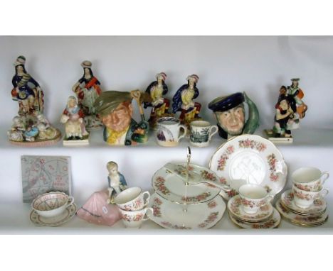 A collection of 19th century Staffordshire figures including The Cobbler and The Widow, 17 cm tall, a shepherd and shepherdes