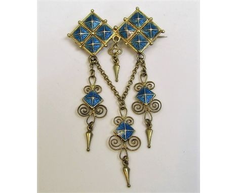 A Scandinavian silver gilt and enamel solje brooch with filigree decoration, attributed to David Andersen, 7.5cm long, 11g