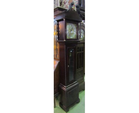 A reproduction mahogany longcase clock (with 11 3/4" square brass dial) silvered chapter ring, cast cherub mask and foliate s